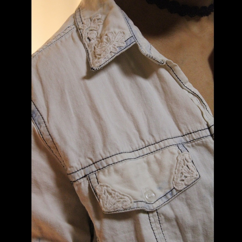 White buttoned top